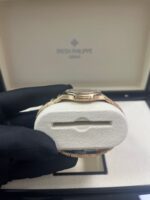 Patek Philippe Nautilus 32mm Diamond Bezel Rose Gold Purple Wave Dial 7010/1R-013 - Image 4