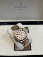 Patek Philippe Nautilus Automatic Rose Gold Baguette Cognac Bezel 7118/1300R-001 - Image 9