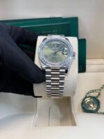 Rolex Day-Date 40 Baguette Diamond Bezel Olive Green Roman Dial President Bracelet 228396TBR German Day Wheel - Image 12